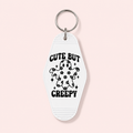 Cute but Creepy | Vintage Style Hotel Keychain